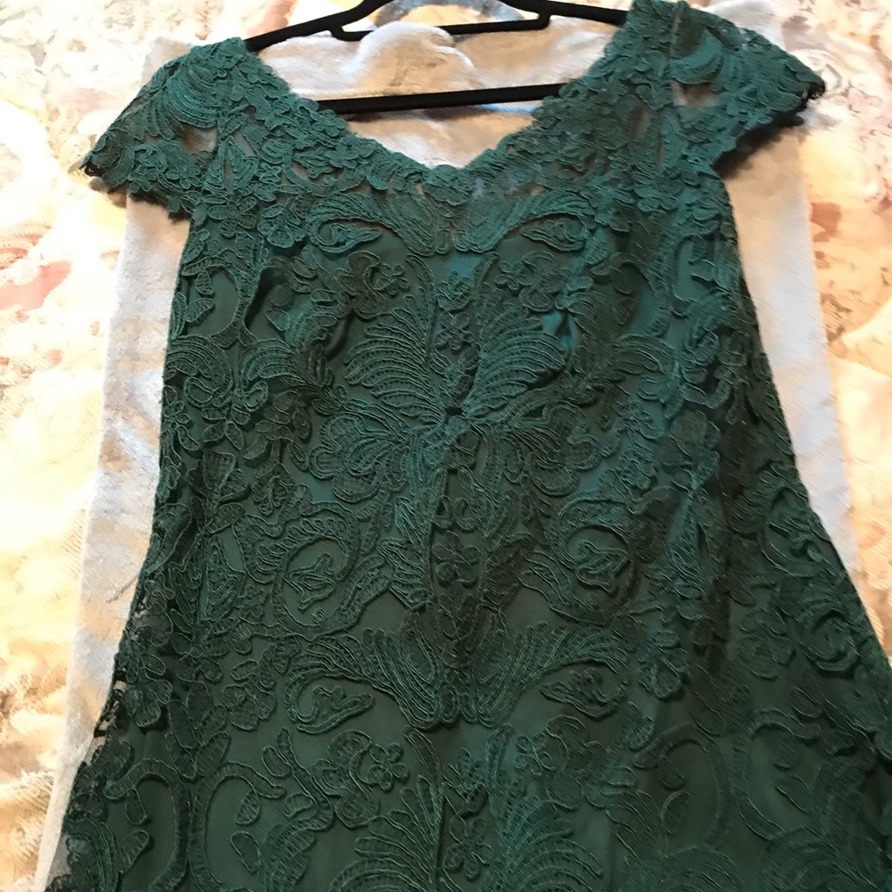 Emerald green embroidered evening gown